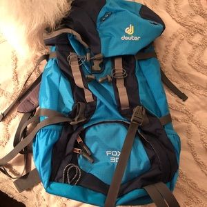 Blue deuter camping backpack